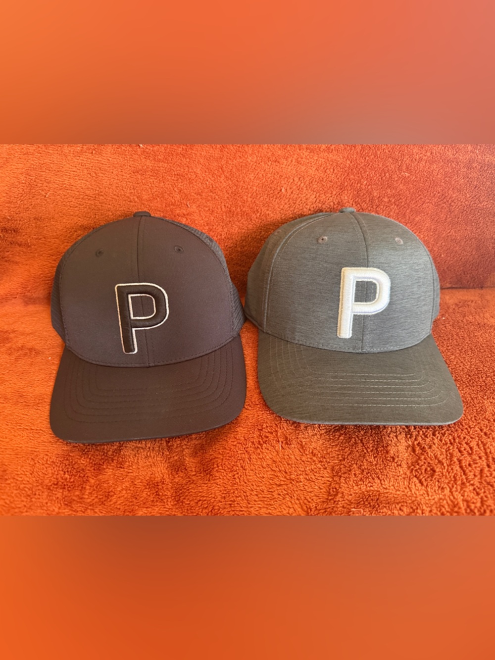 Two Puma golf/baseball caps (SnapBack), black and gray/grey